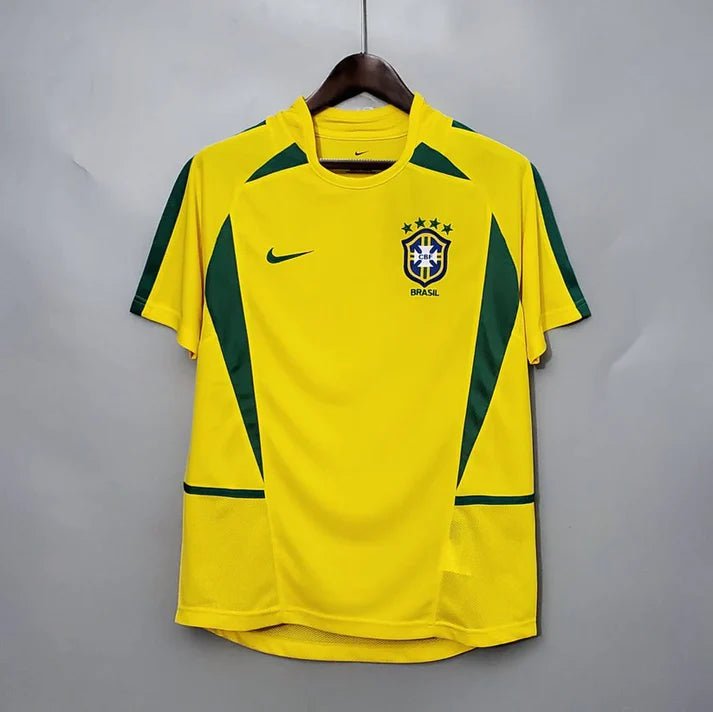 http://www.mykitsdirect.com/cdn/shop/products/brazil-2002-home-shirt-653905.webp?v=1676944337